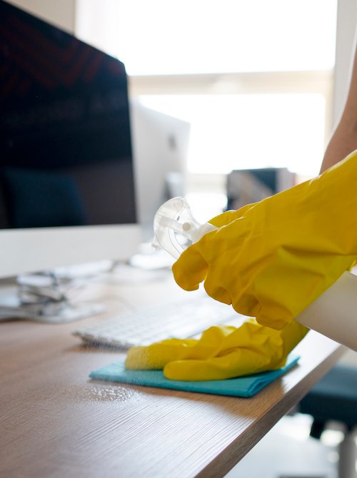 Workstation being wiped and disinfected