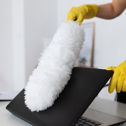 Office being dusted prior to disinfected in GTA